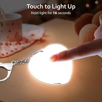 Porte-clés lumineux LED en forme de cœur, portable, avec capteur tactile, rechargeable USB-C, en plastique, idéal pour Halloween, étudiants et cadeaux