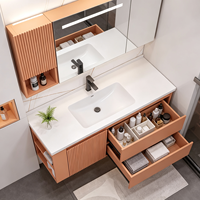 Ensembles de meubles-lavabos modernes en bois avec aspect marbre et miroir LED encadré pour projets résidentiels et hôteliers, personnalisation OEM