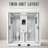Cabine de toilettes portable blanche à double porte avec lavabo central pour les installations extérieures
