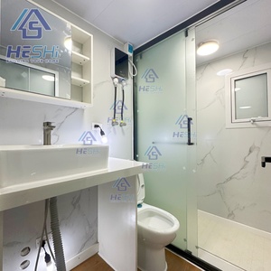 บ้านสำเร็จรูปทรงสี่เหลี่ยมผืนผ้า HESHi รุ่นโมเดิร์น ภายนอกสีขาว พร้อมหน้าต่างสีดำ - Product Image 3