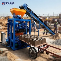 Machine à blocs de béton semi-automatique QT4-24 pour le projet de fabrication de briques en ciment emboîtables en Afrique
