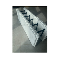 Systèmes de construction extérieurs : Blocs de béton isolant (ICFs) à surfaces texturées, barres d'acier de connexion – Catégorie de produit : Panneaux