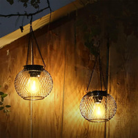 Lanterne solaire ronde en métal avec filet de fil métallique, LED blanc chaud, imperméable, pour extérieur, jardin, cour, patio décoratif