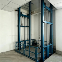 Plateforme élévatrice verticale hydraulique fiable pour le levage de marchandises stationnaires et le transport inter-étages en usine