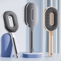 Brosse démêlante de luxe ventilée avec base à aiguilles métalliques, coussin d'air souple et électroplaquée pour femmes et hommes