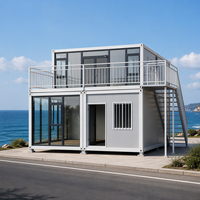 Résidence mobile préfabriquée à 2 étages, design moderne en verre pour la vie en plein air dans le jardin, villa conteneur