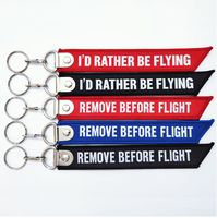 Étiquette de bagage en tissu pour vêtements, patch brodé, porte-clés tissé, étiquette de vol personnalisée avec nom de marque, porte-clés brodé pour équipage, fermeture éclair