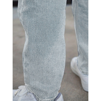 Jean en denim stretch gris clair délavé pour homme, coupe droite ample, effet empilé, avec détail de couture latérale, style streetwear, vente en gros