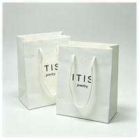 Sacs en papier perforés personnalisés pour les boutiques de vêtements, les cadeaux, les emballages d'achats, les sacs en papier pour bijoux