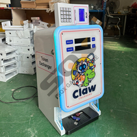 Fourniture directe d'usine Machine de jeu de griffes de cadeau personnalisable Machine de grue de poupée en peluche Machine à griffes à jetons pour les États-Unis, la Thaïlande