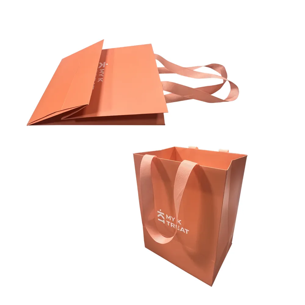 Logotipo personalizado impresso Plain Cheap Craft Paper Bag com alça para roupas de bebê