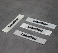 Etiquette en caoutchouc de silicone transparente et souple gaufrée 3D de logo de marque personnalisé pour vêtement