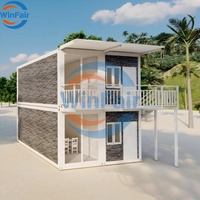 Maison conteneur modulaire à deux étages WinFair en kit avec salle de bain et cour - Design moderne pour le marché paraguayen / Bungalow en bord de mer
