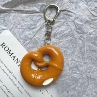 Accessoires de voiture : Porte-clés créatif et fantaisie en silicone, pendentif de sac en forme de poupée, cadeau de festival