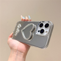 Coque de téléphone de luxe brillante avec strass, support cœur et couronne pour iPhone 18 17 Pro Max 16 15 14 13, avec cordon et miroir de maquillage intégré, protection intégrale