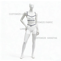 Vêtements de sport pour femmes : Ensemble de yoga avec soutien-gorge dos ouvert et short taille en V, motif cœur et blocs de couleur