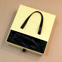 Boîtes rectangulaires en papier artistique aux couleurs douces avec poignée en ruban, boîtes de rangement pour cils entiers, vente en gros, boîtes personnalisables avec logo privé