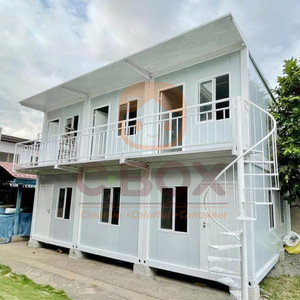 Casa Contenedor Modificada de 2 Pisos con Balcón y Escalera en Espiral para Uso Residencial - Product Image 1