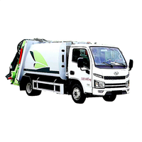 Camion poubelle à benne suspendue à compression