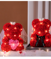 Vente chaude 2024 cadeaux de noël à la main éternelle Rose ours Rose artificielle ours en peluche avec boîte robe de mariée couronne