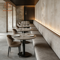 Table carrée en pierre gris moderne, canapé de café rembourré en tissu, table et chaises pour restaurant