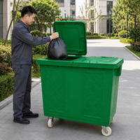 Conteneur à déchets extérieur commercial de 600 L en acier galvanisé vert avec 4 roulettes pivotantes