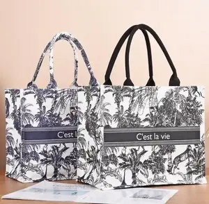 Sac fourre-tout en toile écologique, durable et à motif de logo personnalisé de haute qualité avec sac fourre-tout brodé pour femmes pour le voyage