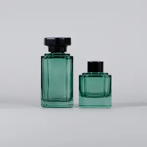 नई शैली थोक गहरे हरे रंग की 100 मिलीलीटर चौकोर रंग की खाली सुगंध रीड डिफ्यूज़र कांच की बोतलें ढक्कन के साथ