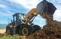 Pelle de chargement 848H : Interface d'attachement polyvalente, configuration flexible pour la manutention de pierre, de terre et de matériaux de construction