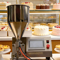 Machine de remplissage pour pâtisseries (tartes aux œufs, gâteaux, cupcakes, choux à la crème, beignets, croissants, biscuits, muffins) avec garnitures confiture et crème au chocolat
