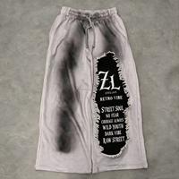 Pantalon de survêtement large pour homme, délavé dégradé, avec bords effilochés, imprimé textuel, taille élastique, style grunge streetwear