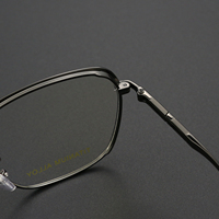 Kacamata Pria Oval Full-Rim Titanium Solid Tahan Lama Langsung dari Pabrik Model 5014 Gaya Bisnis Fashion