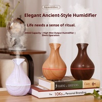 Diffuseur d'huiles essentielles portable mini 200 ml, humidificateur à grain de bois avec 9 couleurs d'éclairage d'ambiance nocturne