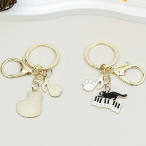Llavero colgante de aleación con diseño de gato y nota musical de piano, estilo literario, para bolso - Product Image 5