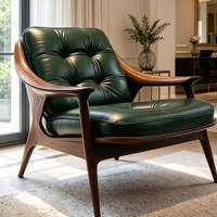 Fauteuil d'appoint individuel en cuir touffeté vert foncé avec accoudoirs en fibre de verre et finition bois de noyer pour salon de style mid-century