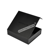 Boîte cadeau en carton rigide en forme de livre noire personnalisée avec fermeture magnétique et impression de logo pour un emballage de qualité supérieure