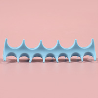Nouvel outil de manucure 2 en 1 : séparateur d'orteils en silicone en forme d'arête de poisson et support pour stylo à ongles