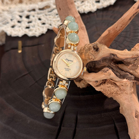 Montre pour femmes élégante et luxueuse avec pierres précieuses, style vintage avec cadran en perles PRO19