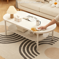 Table basse ovale blanc crème avec étagère de rangement à 2 niveaux, table centrale double couche de style français moderne pour la décoration du salon