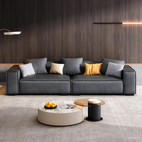 Ensemble de canapés modulaires surdimensionnés Cloud avec tissu bouclé crème et structure en bois massif robuste pour les espaces de vie modernes et spacieux