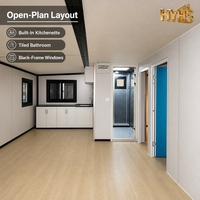 Maison conteneur moderne extensible de luxe 40 pieds, cadre noir, jaune désert, étanche et résistante au vent, idéale pour hôtel ou bureau, garantie 5 ans