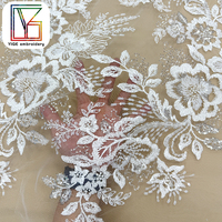 Tissu en dentelle africaine de haute qualité en gros, tissu en dentelle perlée, tissu en maille de dentelle, tissu brodé de sequins pour robes de mariée