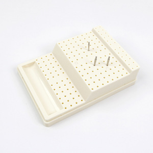 Boîte de stérilisation pour fraises dentaires, étui de rangement blanc cassé à 168 trous pour fraises à basse et haute vitesse et têtes de meulage - Product Image 1