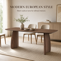 Table à manger de style européen moderne en bois d'acajou avec plateau en oxyde de magnésium à bords arrondis et pieds incurvés