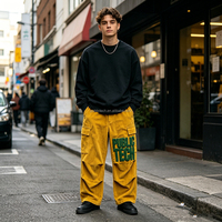 Pantalon cargo baggy en velours côtelé personnalisé par le fabricant, avec broderie chenille 3D et plis aux genoux, style workwear et streetwear