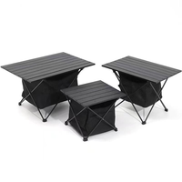 Table de pique-nique pliable légère MING CHAN pour l'extérieur avec une pochette en tissu pour le rangement, adaptée aux pique-niques et au camping.