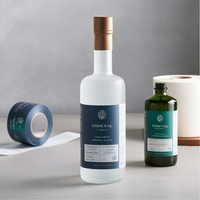 Autocollants en vinyle personnalisés imprimant des étiquettes de bouteille en plastique en verre imperméables pour l'autocollant de rouleau d'étiquette de boisson non alcoolisée