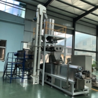 Extrudeuse de nourriture pour chiens et chats avec équipement de traitement et de séchage à double vis pour la production de granulés d'aliments pour animaux de compagnie