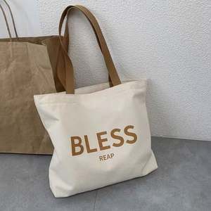 กระเป๋าช้อปปิ้งผ้าแคนวาสหูเชือกฝ้ายแบบใช้ซ้ำได้ ดีไซน์สวย เป็นมิตรกับสิ่งแวดล้อม ขายส่งราคาพิเศษ พร้อมพิมพ์โลโก้ตามสั่ง - Product Image 6