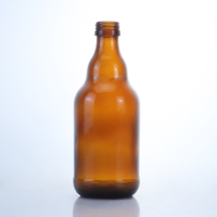 Bouteille de bière vide en verre ambré standard avec bouchon couronne – Vente en gros et fabrication